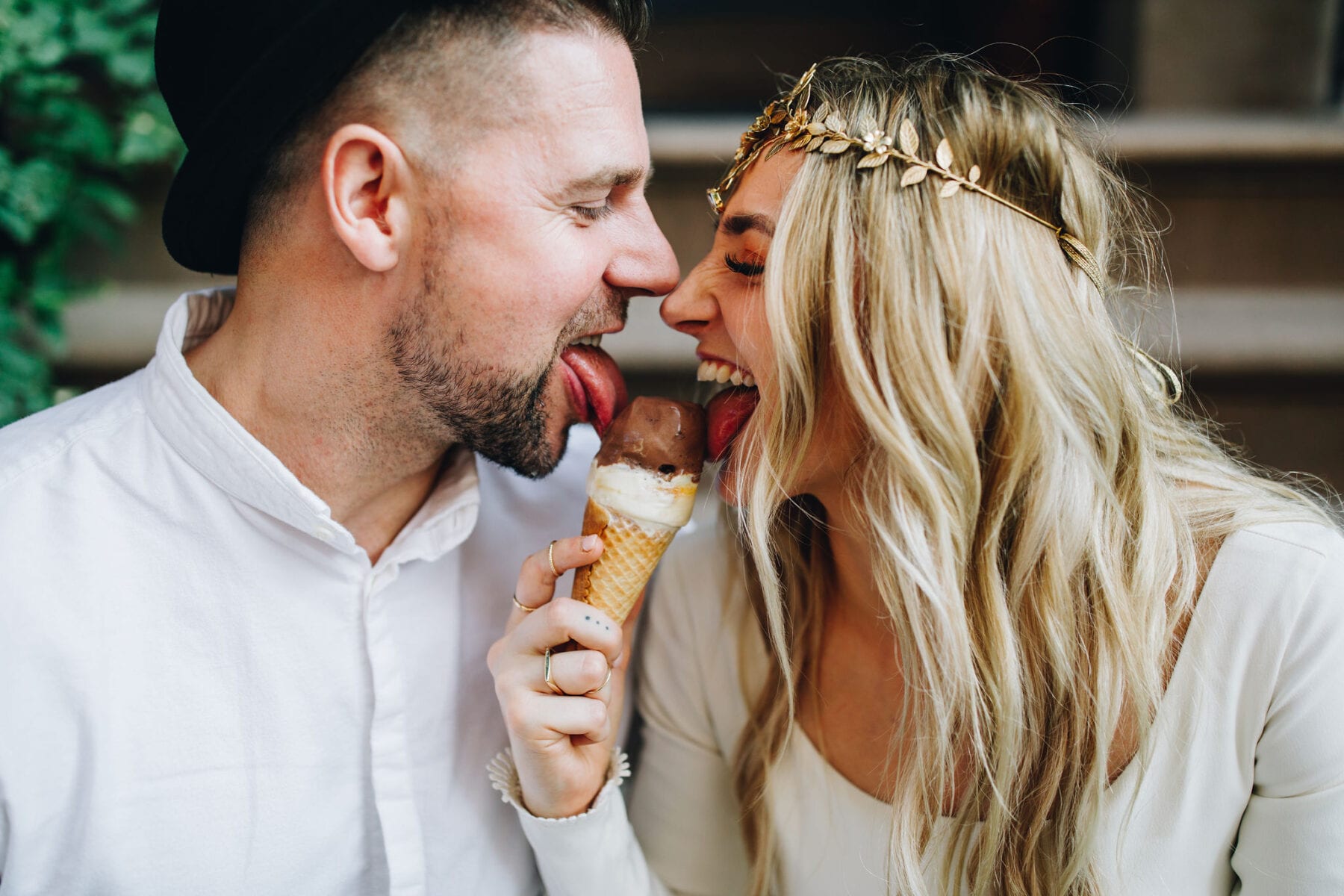 Bride and groom eating ice-cream