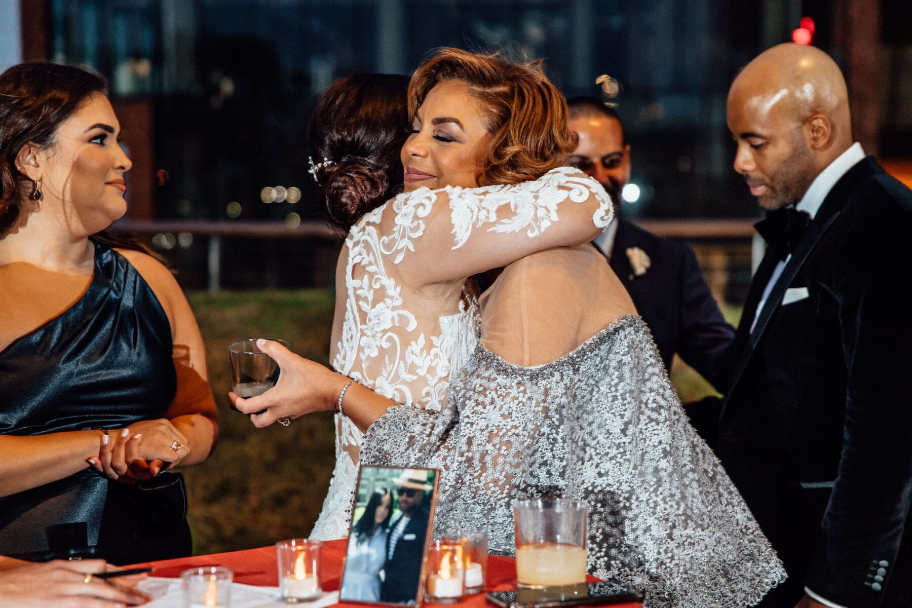 Bride hugging her mother