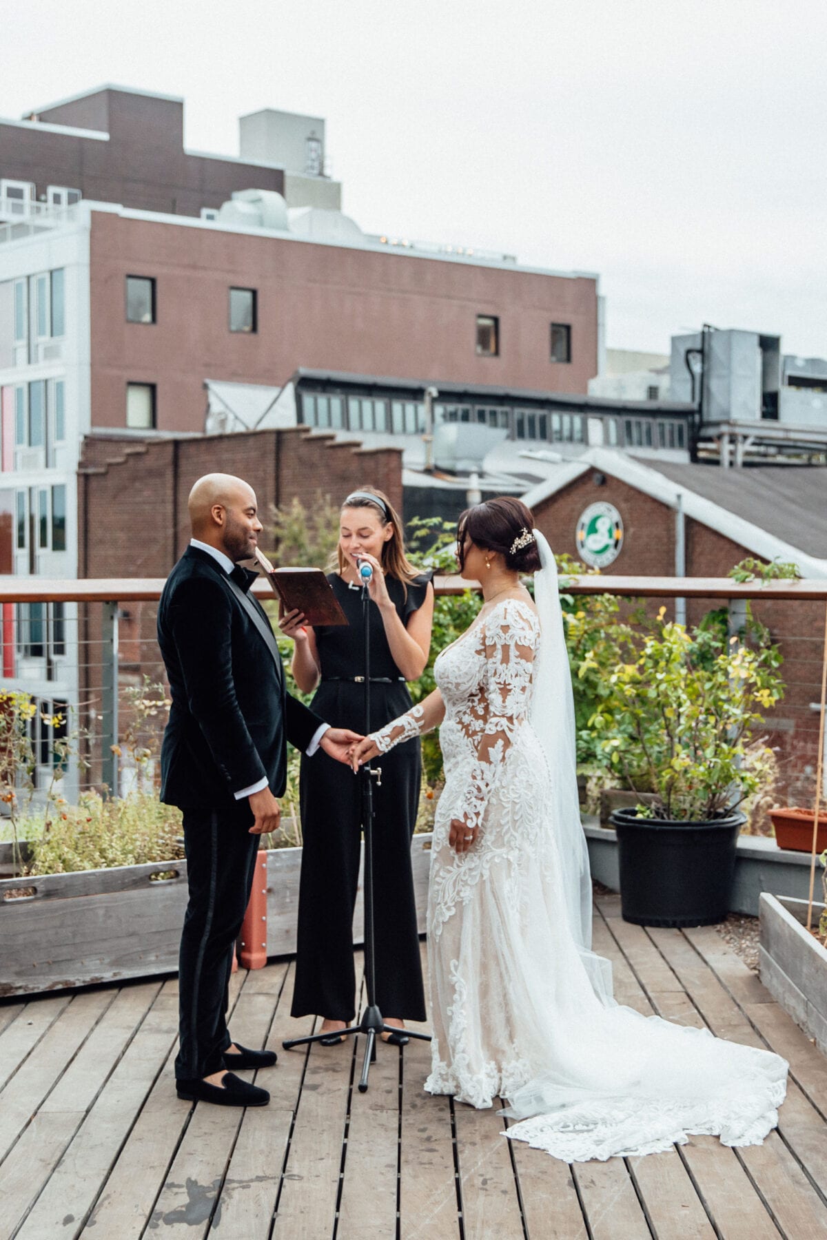 Bride and groom holding hands